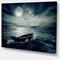 Designart - Boat Drifting Away After Storm - Seashore Canvas Art Print